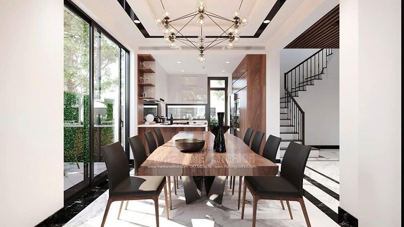 Mẫu bàn ăn gỗ óc chó cao cấp kết hợp với ghế ăn bọc nệm tạo nên bộ bàn ăn sang trọng cho không gian phòng ăn biệt thự gia chủ